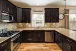 Granite counters and stainless appliances for your master chef